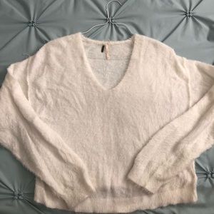 White fuzzy sweater